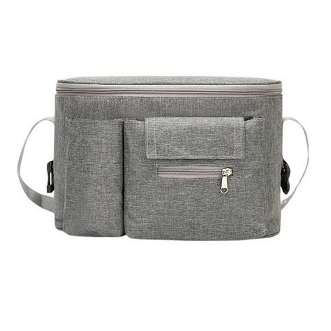 Detailaufnahme eines Reisebuggys mit integrierter Tasche und Getränkehalter.