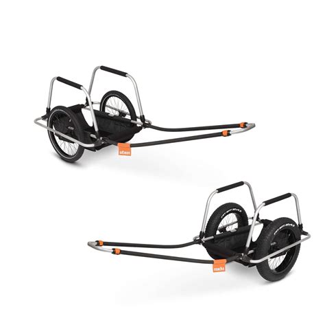 Verschiedene Fahrradanhänger-Modelle nebeneinander mit Preisangaben