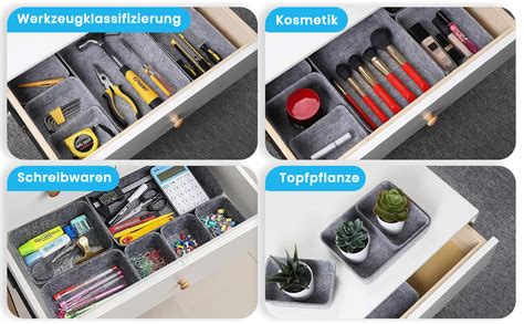 Stapel von Babykleidung in verschiedenen Größen, die ordentlich in Schubladen sortiert sind.