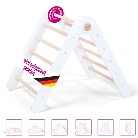 Foto: babybay® Kletterdreieck Littlefoot in einem Kinderzimmer, ein Kind klettert darauf