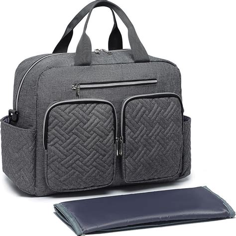 Illustration einer kompakten Wickeltasche mit mehreren Fächern und einem isolierten Seitenfach für Flaschen.