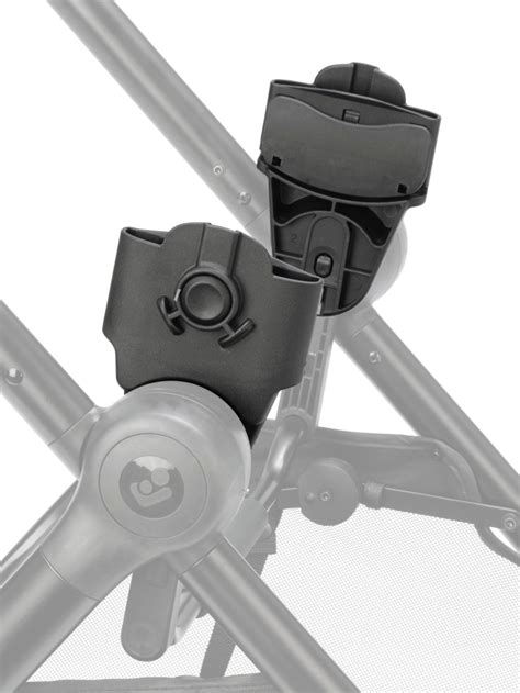 Illustration eines Maxi-Cosi Adapters, der auf ein Kinderwagengestell gesteckt wird