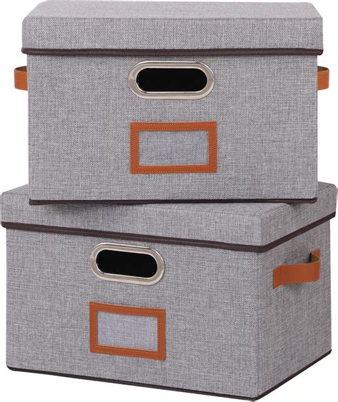 Detailansicht der Stoffboxen mit Metall-Griffösen und dem Auto-Aufdruck