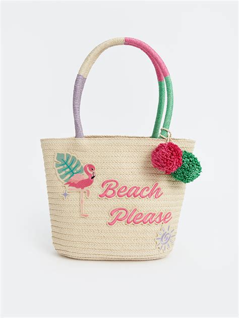 Bestickte Strohtasche mit sommerlichen Motiven