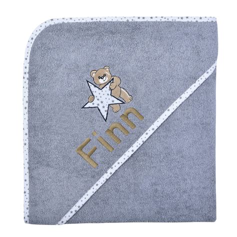 Ein kuscheliges Baby-Set mit Kapuzenhandtuch und Waschhandschuh