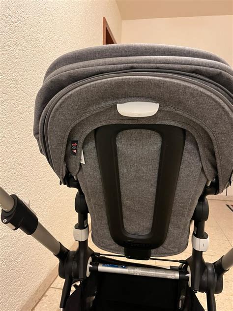 Illustration des Bugaboo Fox Kinderwagens mit Fokus auf die Räder und Federung