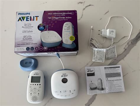 Illustration der Elterneinheit und Babyeinheit des Philips AVENT SCD735 mit hervorgehobenen Tasten und Anzeigen.
