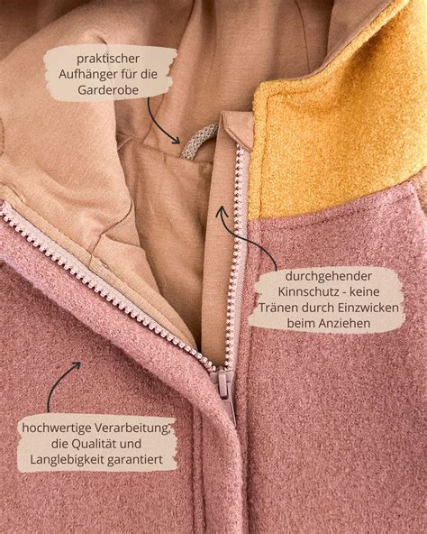 Detailaufnahme des JAKO-O Schlafsacks, die das Mitwachs-System und den Kinnschutz am Reißverschluss zeigt.