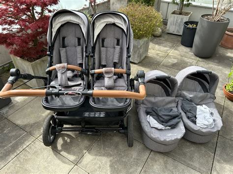 Verschiedene Hartan Netzkörbe für Kinderwagen-Einkaufskörbe nebeneinander.